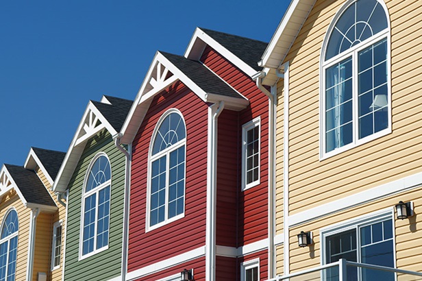 angle shot of brightly-colored townhouses