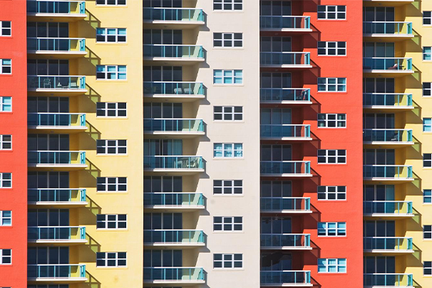 Apartment building with five sections of color