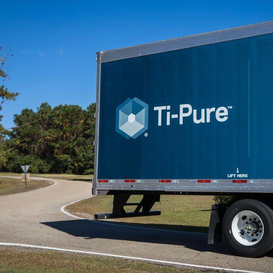 back of a ti-pure truck under a clear sky